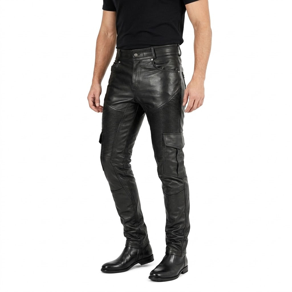 A model wearing black leather biker pants with ribbed knee panels and cargo pockets, paired with a black t-shirt and black leather boots, against a plain white background.