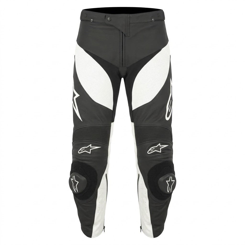 Alpinestars motorcycle riding pants in black and white, featuring protective knee pads and the brand's star logo on the thighs and knees.