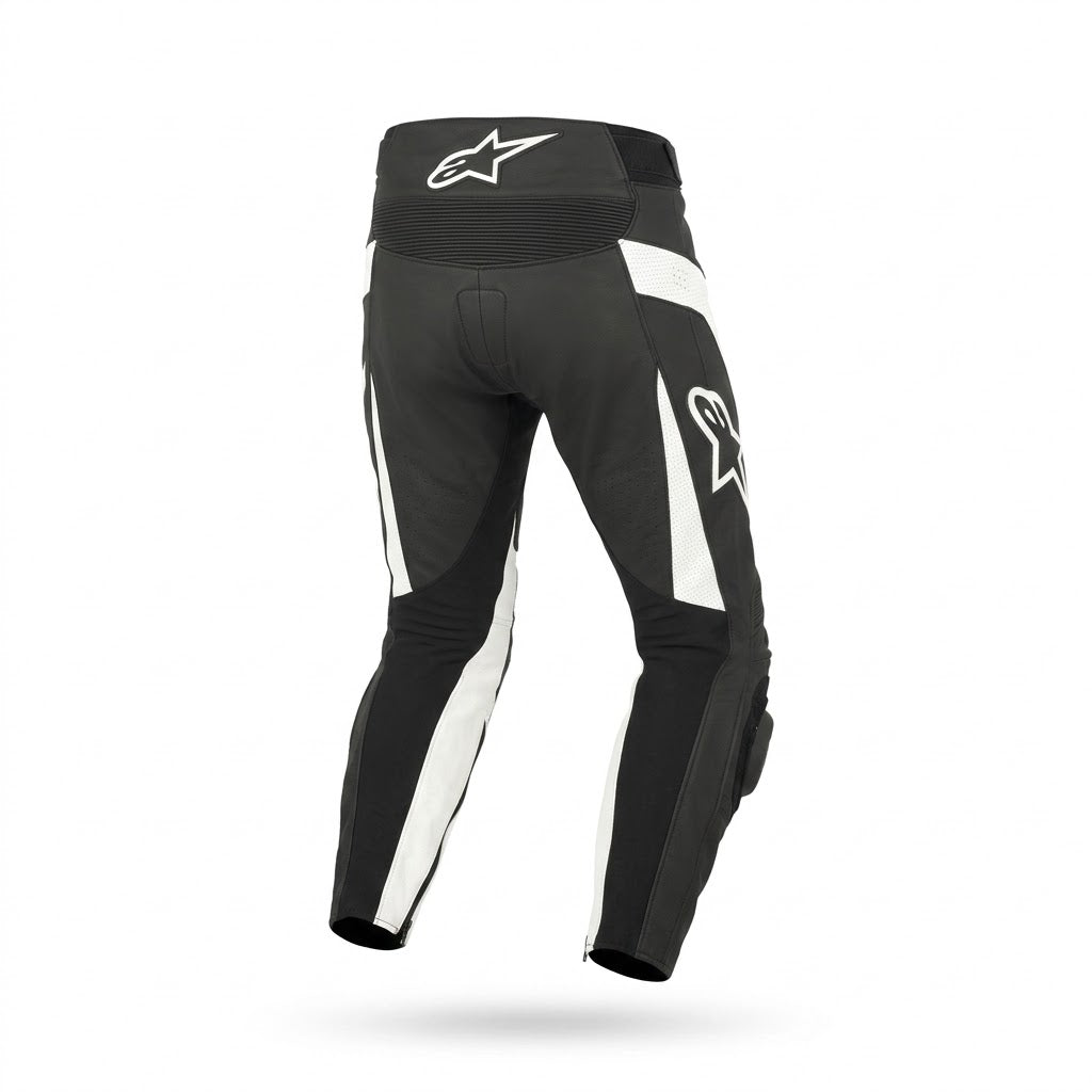 Black and white Alpinestars motorcycle pants shown from the rear, featuring white Alpinestars logos on the back waist and left thigh, with white side panels and black protective padding.